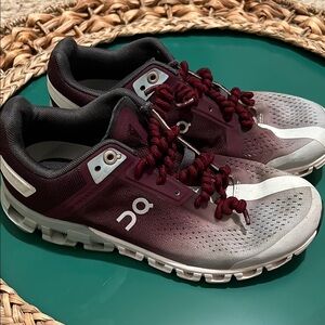On Running Burgundy and Gray Sneakers